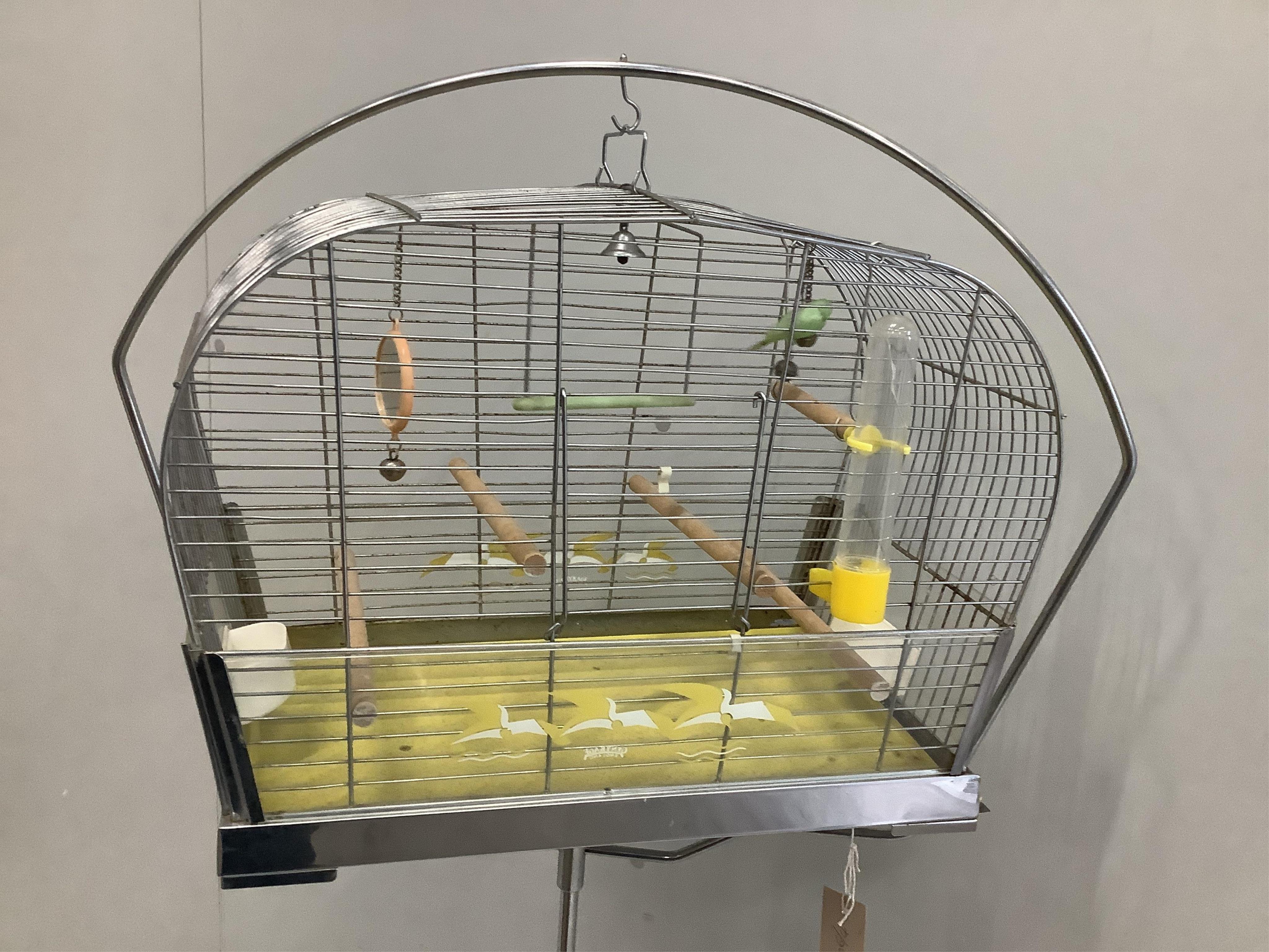 A vintage Genykage chrome plated bird cage on stand, height 160cm. Condition - fair to good